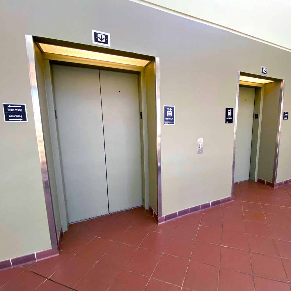 Elevators & Utility Services. Two sets of elevator doors.